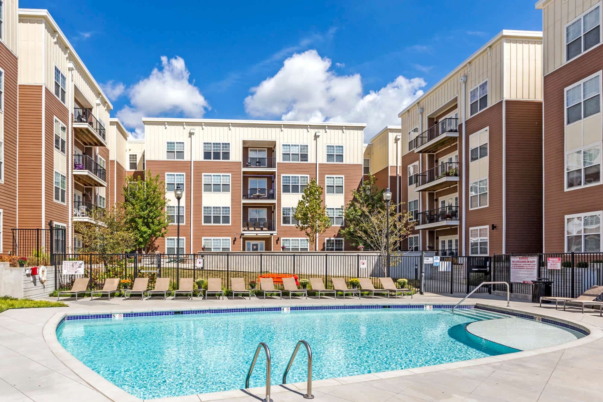 the park on morton off campus apartments near indiana university bloomington iu resort style pool and sundeck lounge seating